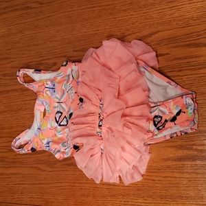 Cat and Jack bathing suit with a snap at the bottom 5T fits more like a 4T peach